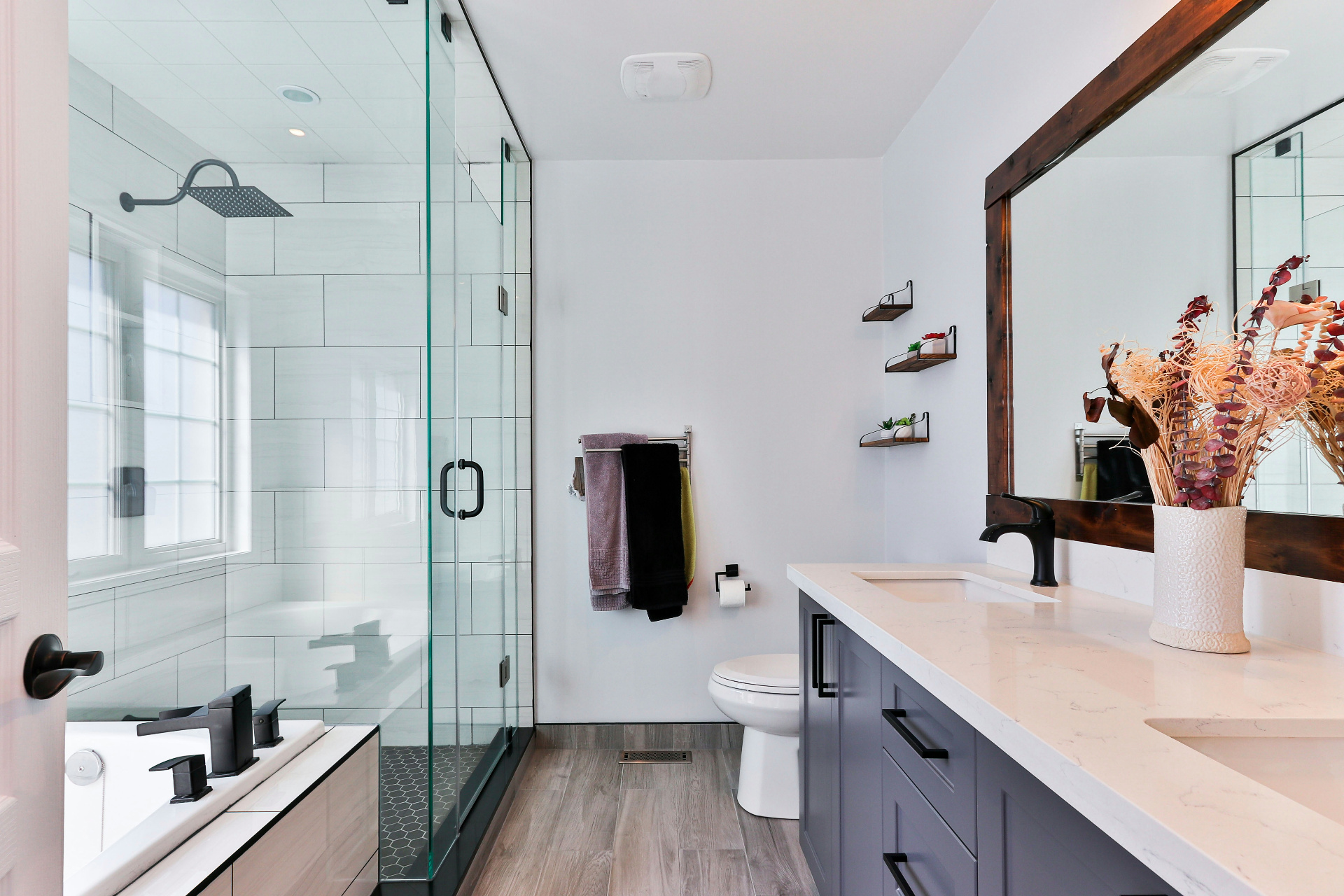 Sparkling clean white bathroom with brass fixtures